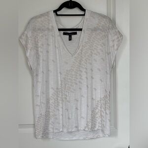 White House Black Market White V-Neck Short Sleeve Tee with muted gold pattern